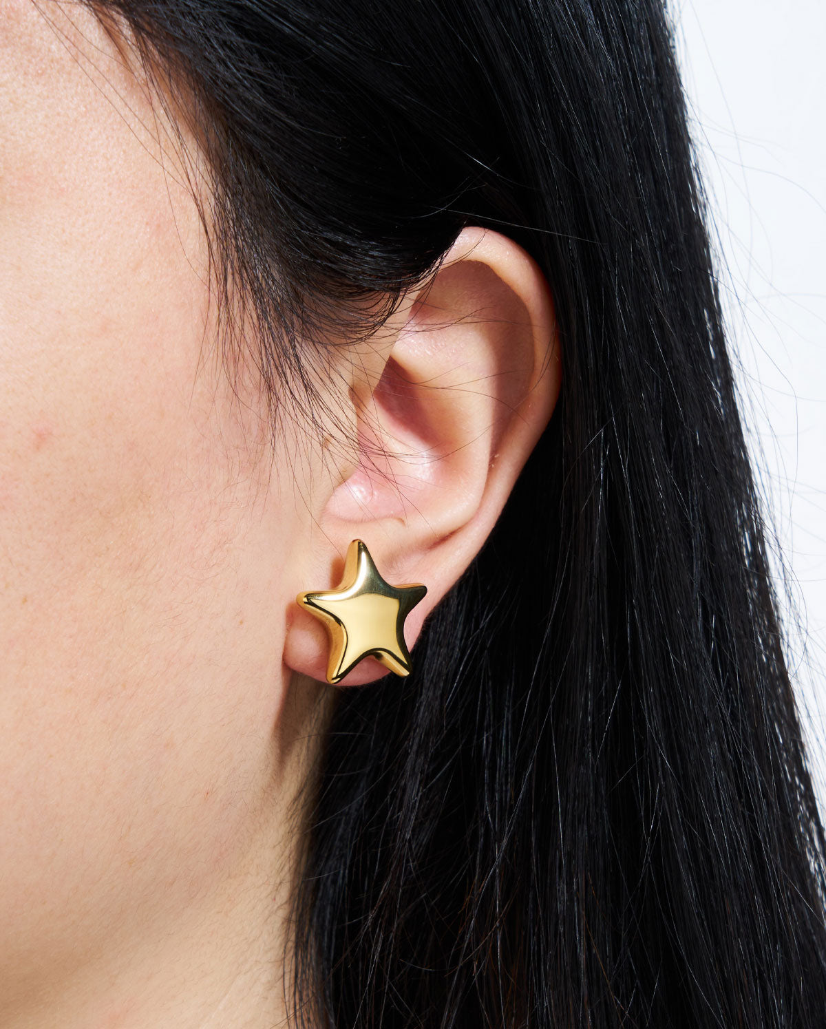 gold star earrings