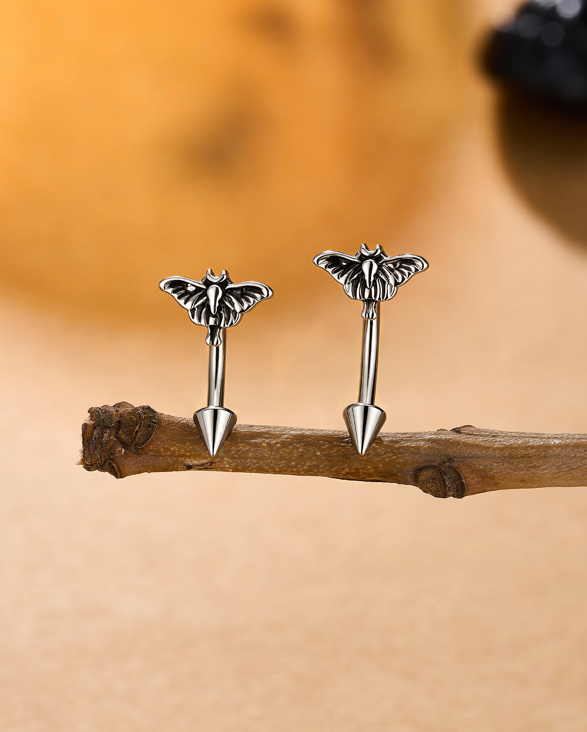 16g Moth Spike Curved Barbell Eyebrow Ring
