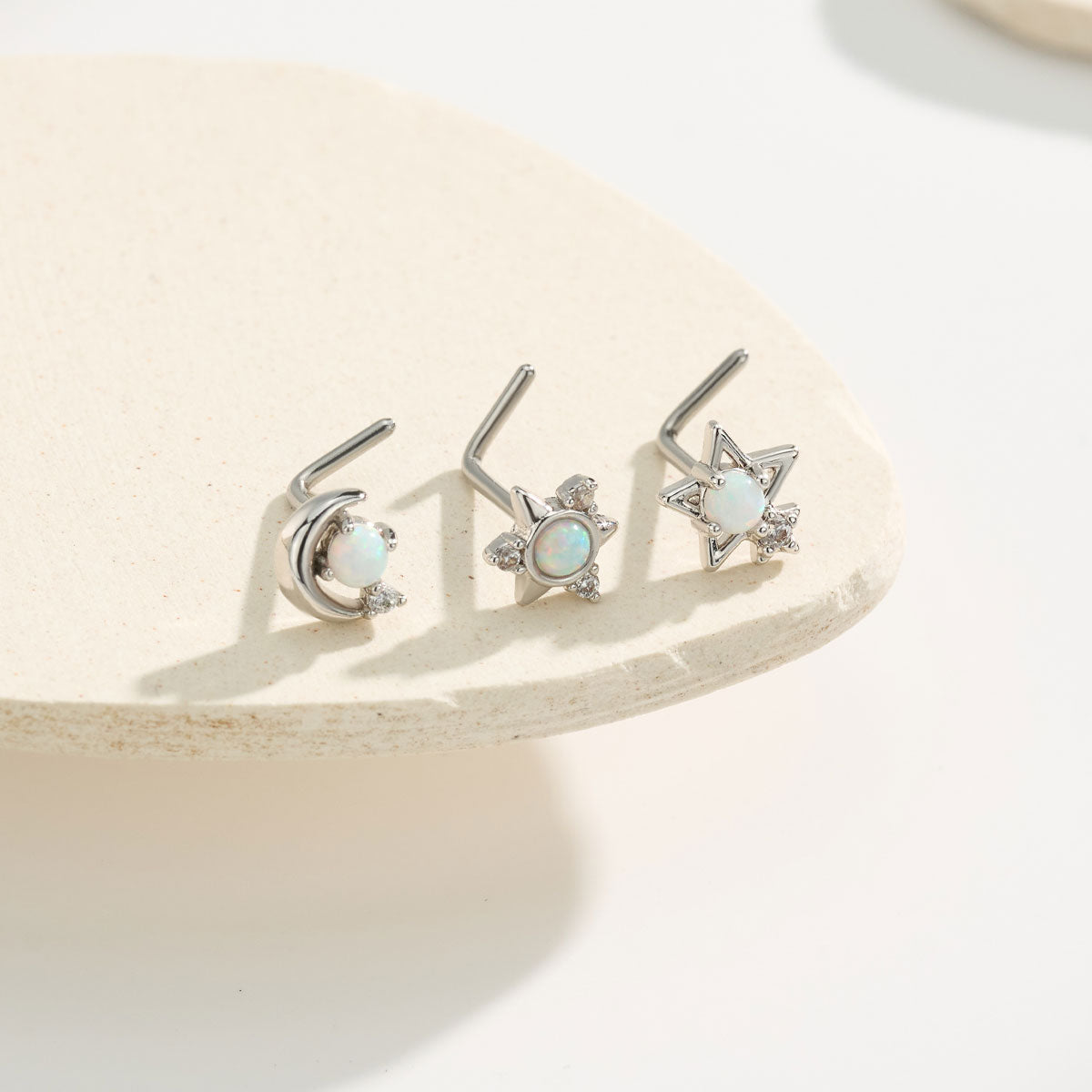 L shaped star nose stud set