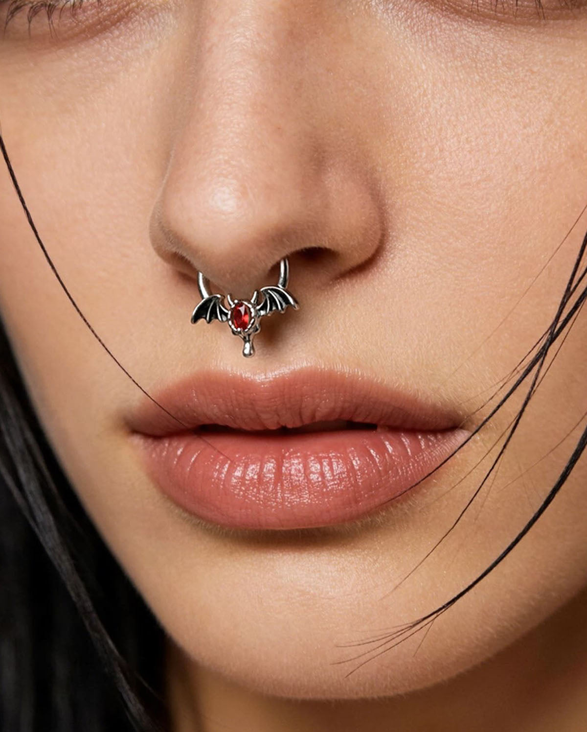 devil eye septum piercing