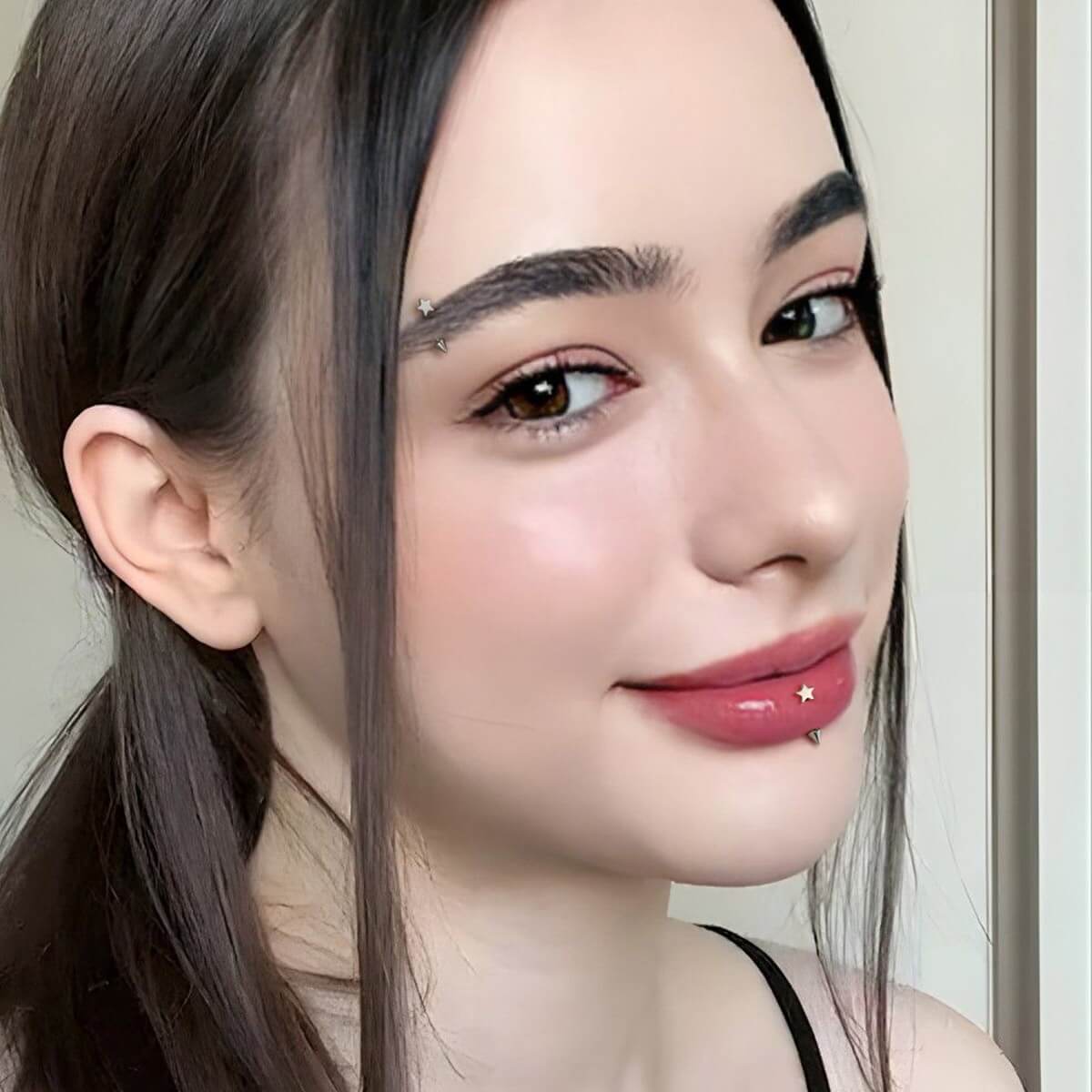 Star Curved Titanium Eyebrow Ring