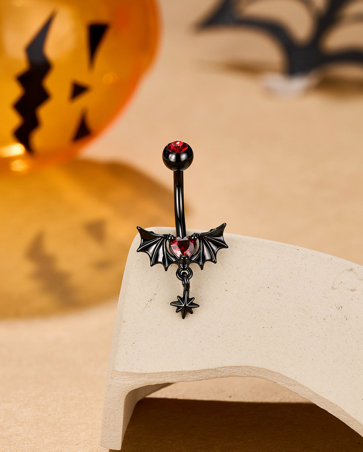 black bat wing red heart belly ring 