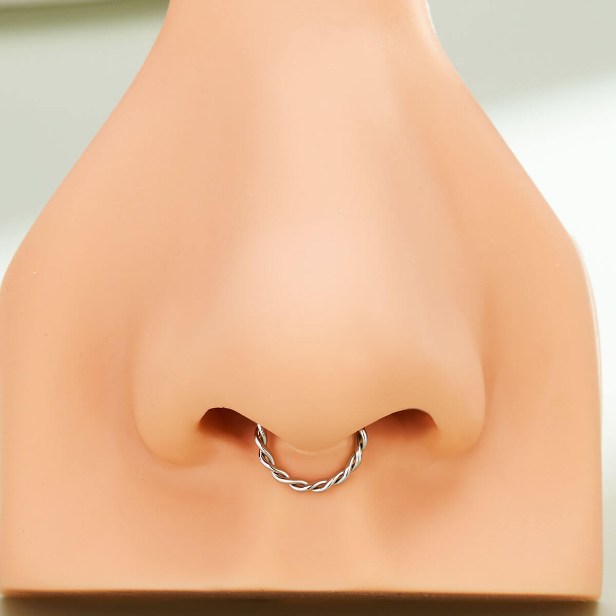 braided septum piercing