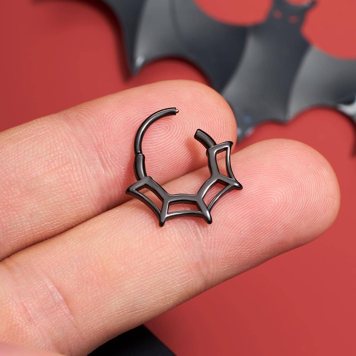 black hinged spider web septum ring